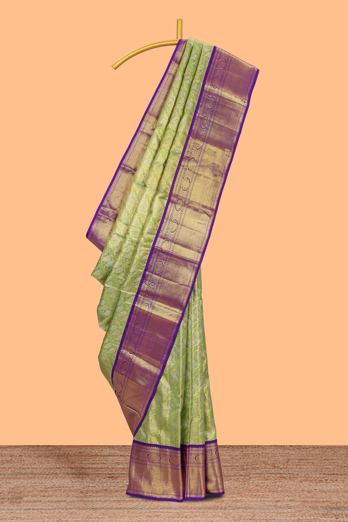 Parrot green paisley pattern Kanchipuram traditional silk saree with contrast zari border and zari pallu comes with blouse