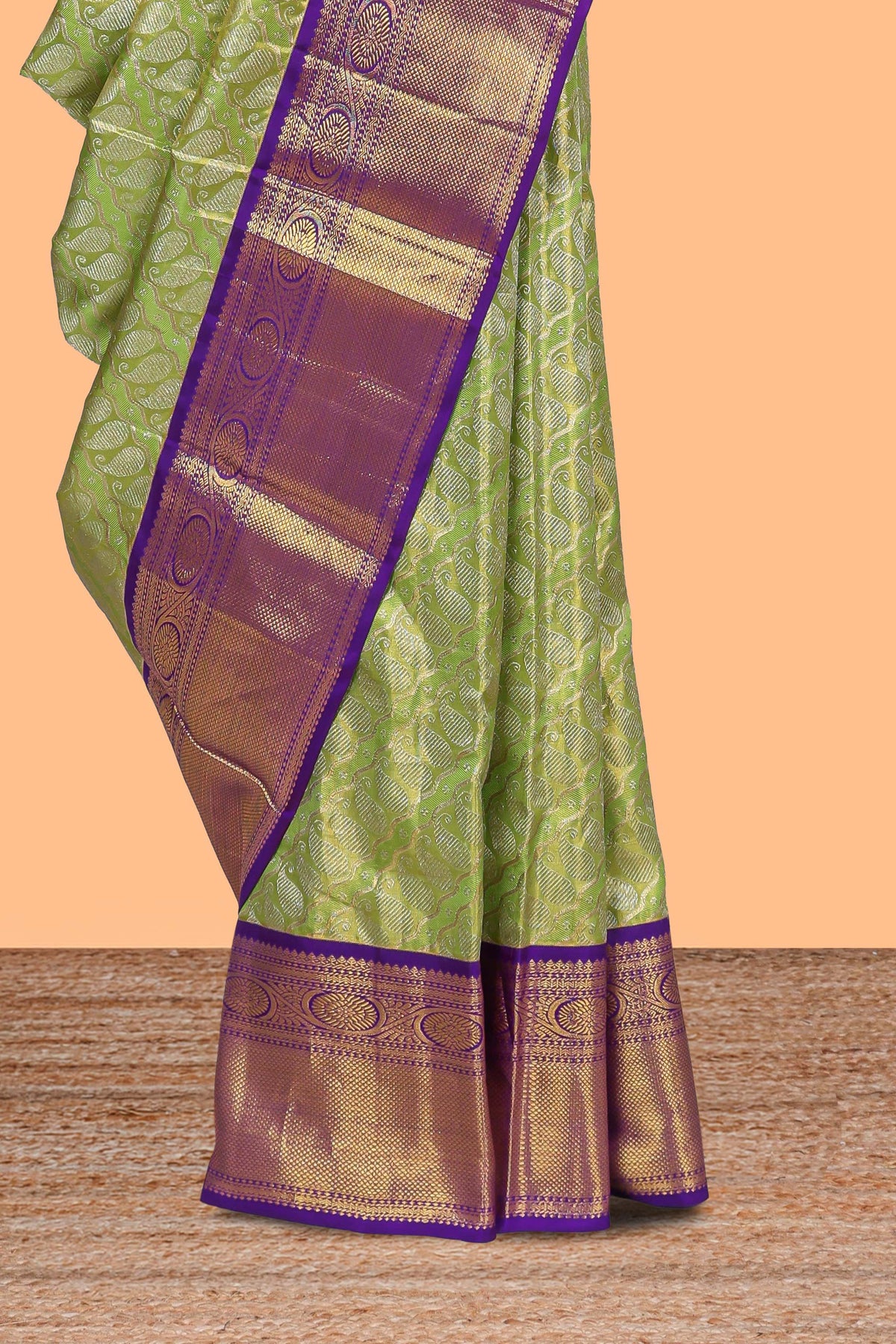 Parrot green paisley pattern Kanchipuram traditional silk saree with contrast zari border and zari pallu comes with blouse