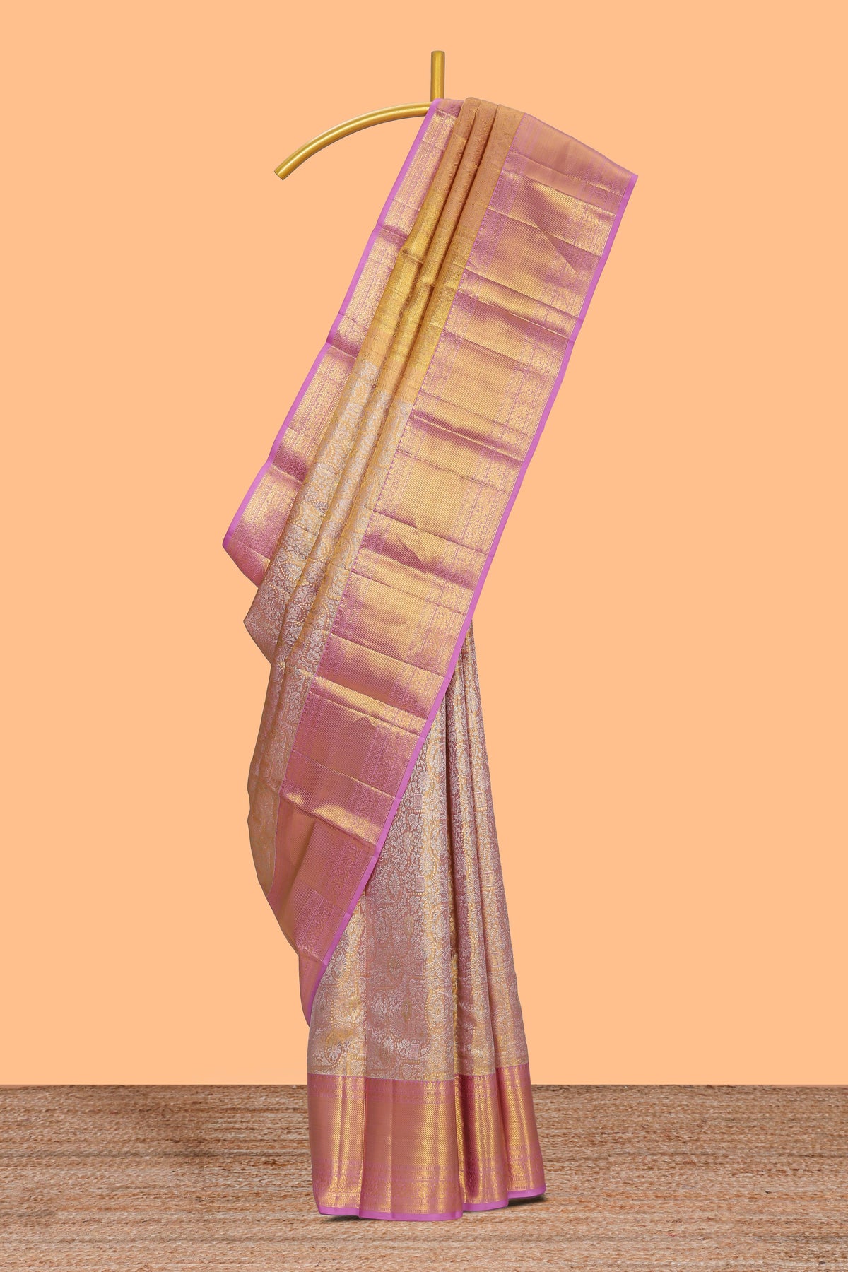 Rose pink floral designed  Kanchipuram tissue silk saree with self zari border and zari pallu comes with matching  blouse