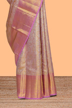 Rose pink floral designed  Kanchipuram tissue silk saree with self zari border and zari pallu comes with matching  blouse