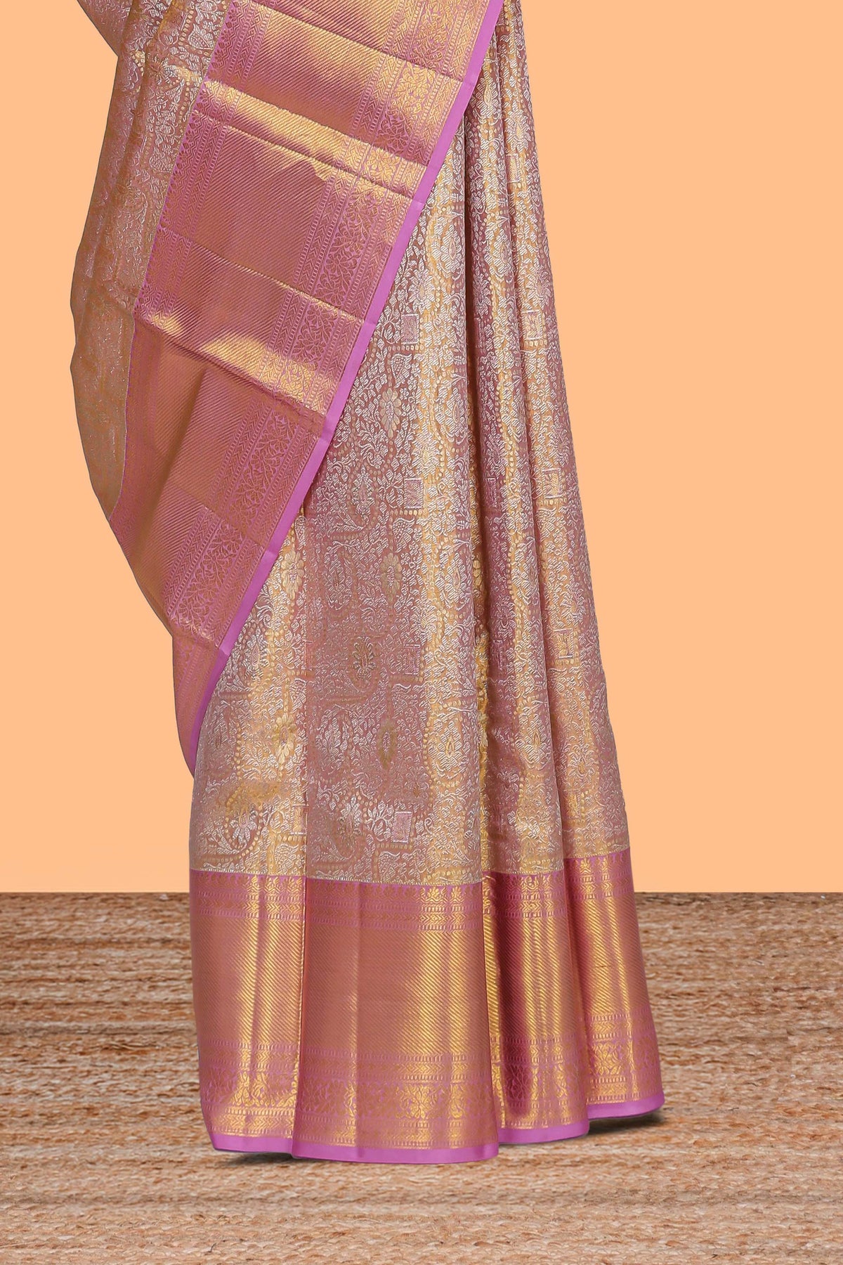 Rose pink floral designed  Kanchipuram tissue silk saree with self zari border and zari pallu comes with matching  blouse
