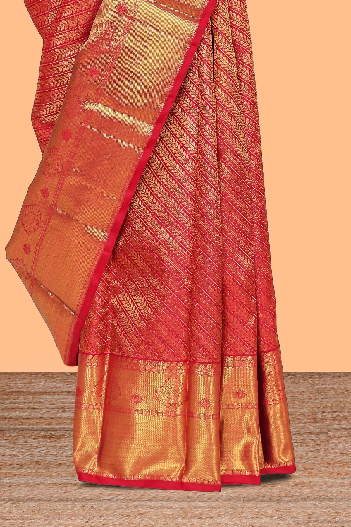 Red floral striped Kanchipuram wedding silk saree with self zari border and zari pallu comes with matching blouse