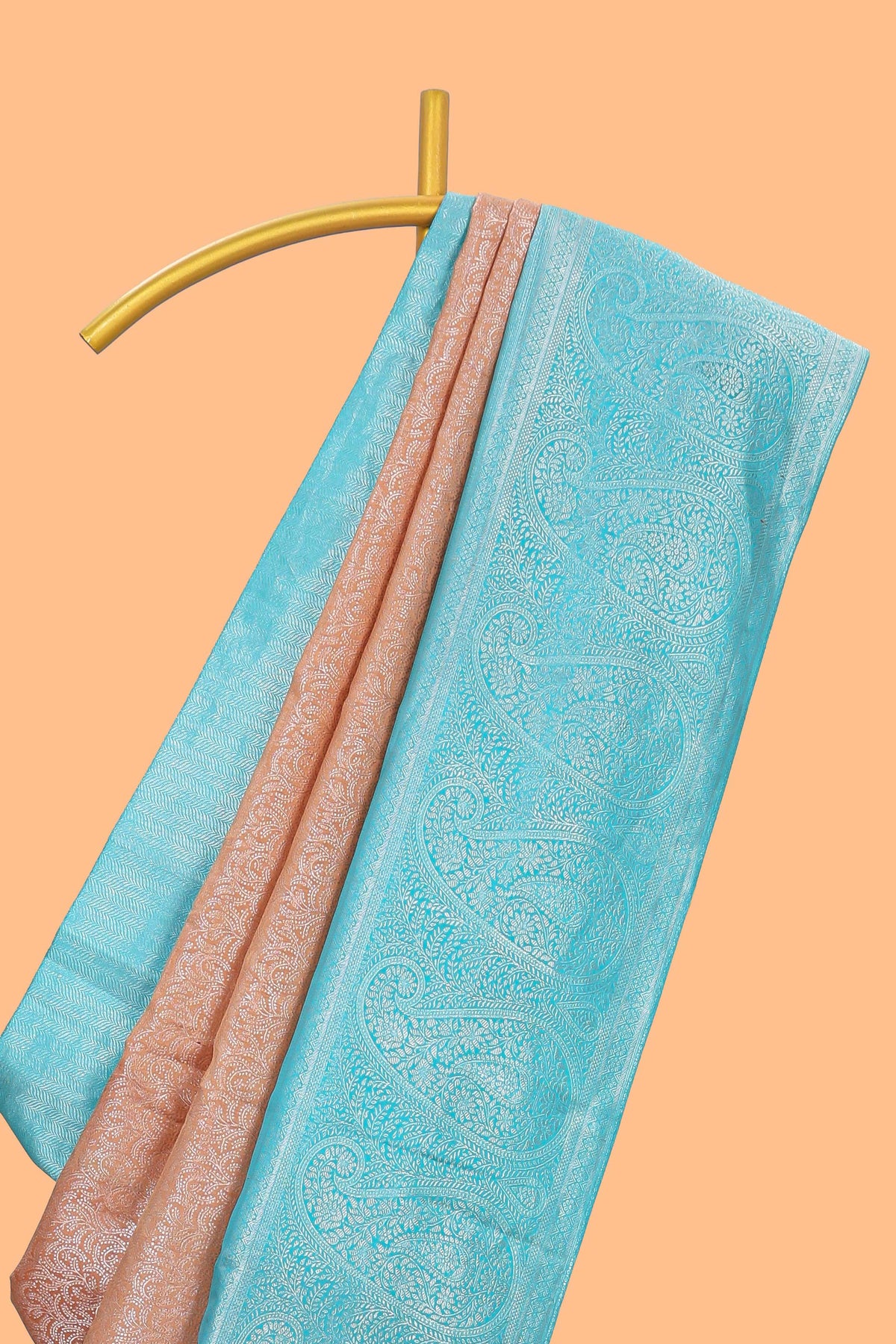 Dusty peach floral designed  Kanchipuram designer silk saree with contrast zari border and zari pallu comes with blouse