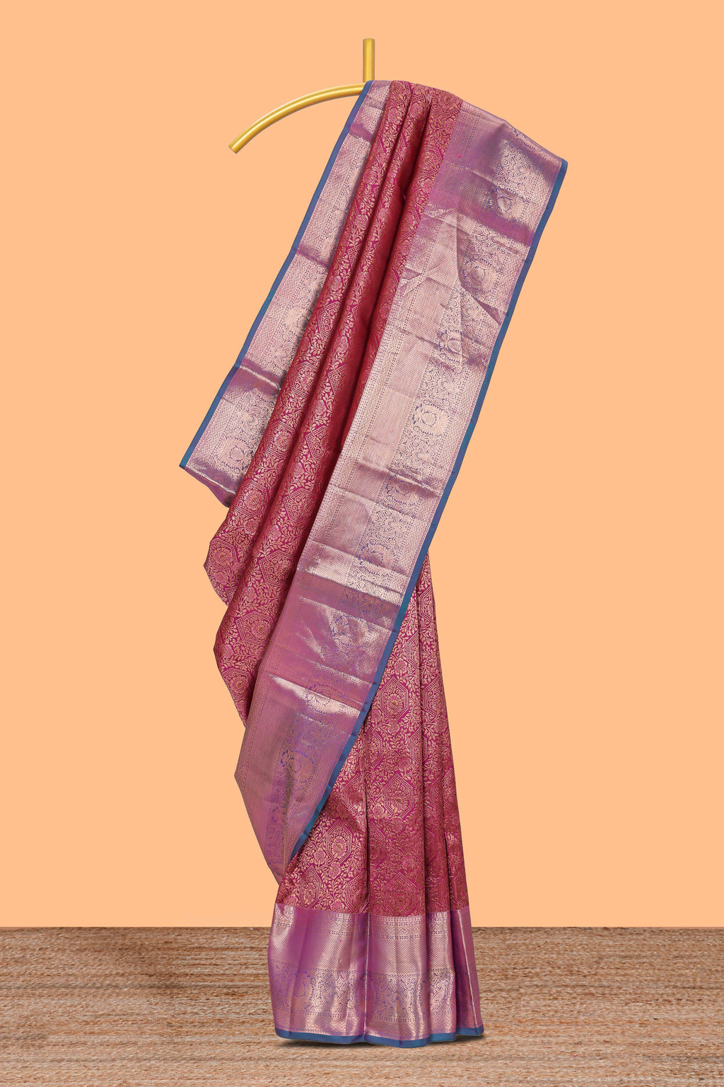 Magenta floral designed Kanchipuram silk saree with contrast zari border and zari work pallu comes with contrast blouse