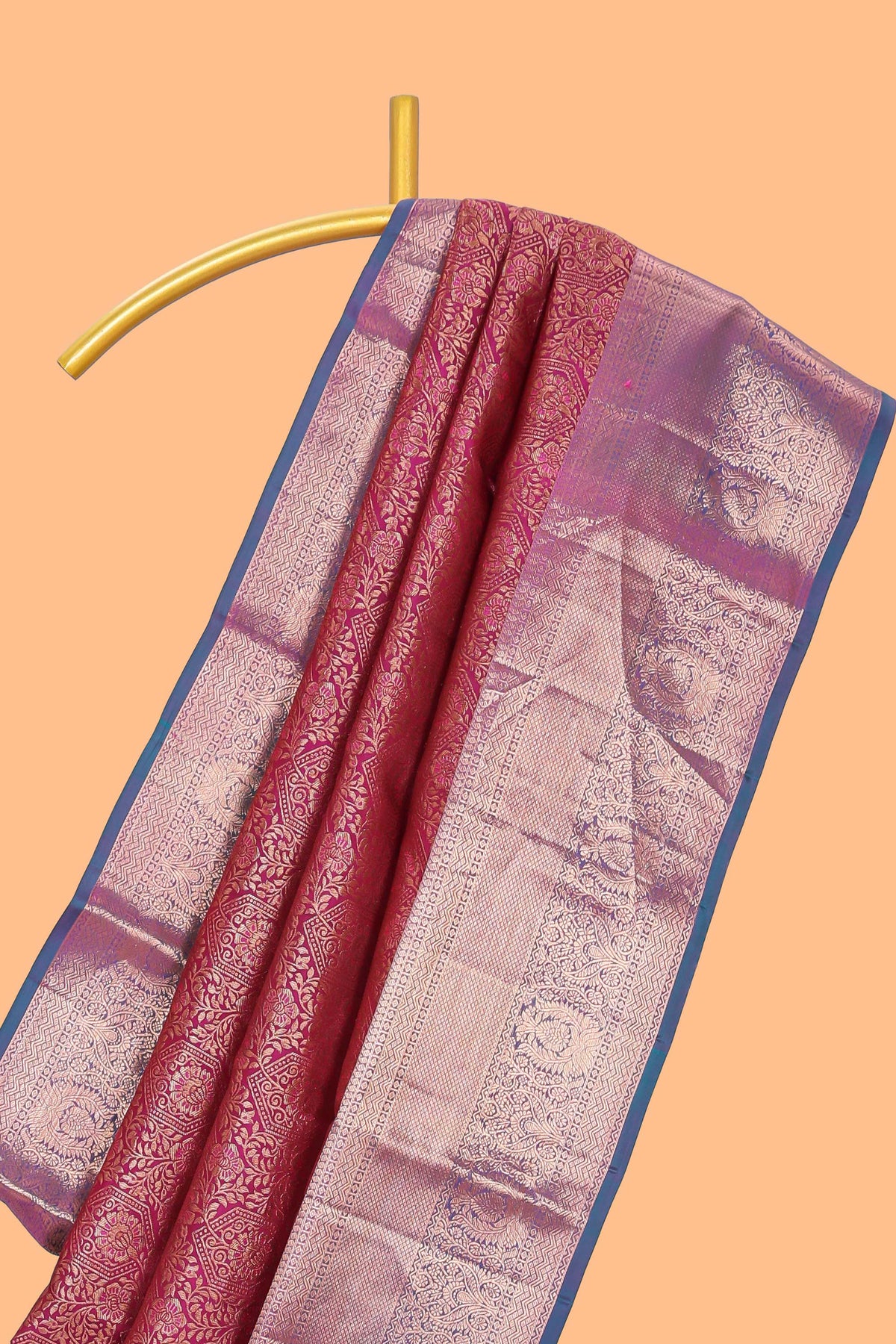 Magenta floral designed Kanchipuram silk saree with contrast zari border and zari work pallu comes with contrast blouse