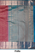 Magenta floral designed Kanchipuram silk saree with contrast zari border and zari work pallu comes with contrast blouse
