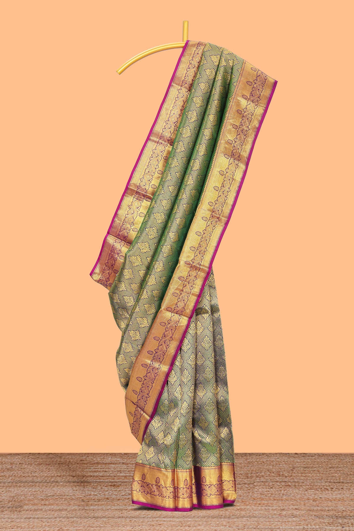Green zari designed floral motifs Kanchipuram silk saree with contrast zari border and zari work pallu comes with contrast blouse