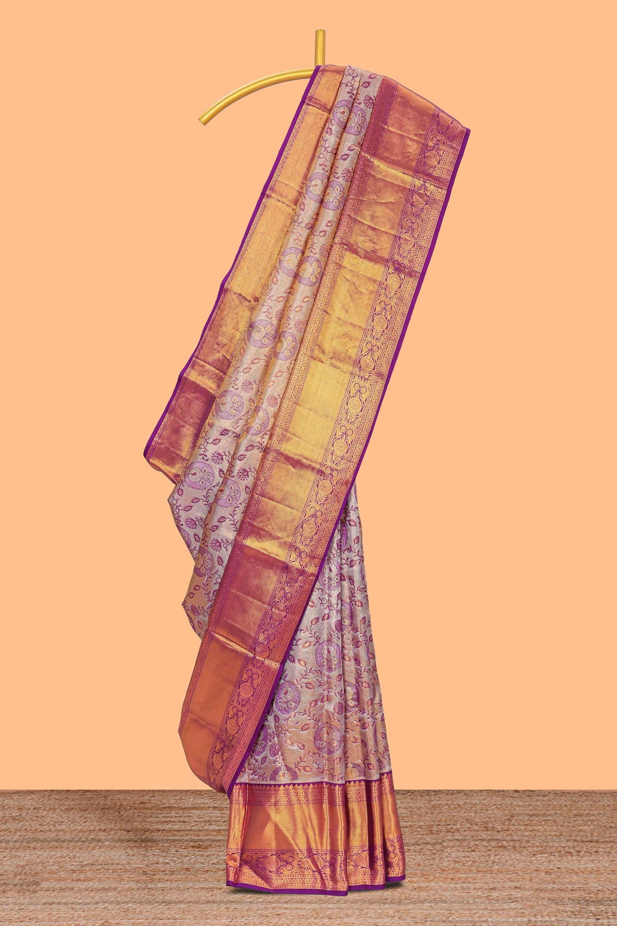 Violet zari floral designed Kanchipuram tissue silk saree with self zari border and zari work pallu comes with matching blouse
