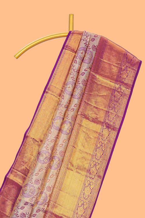 Violet zari floral designed Kanchipuram tissue silk saree with self zari border and zari work pallu comes with matching blouse