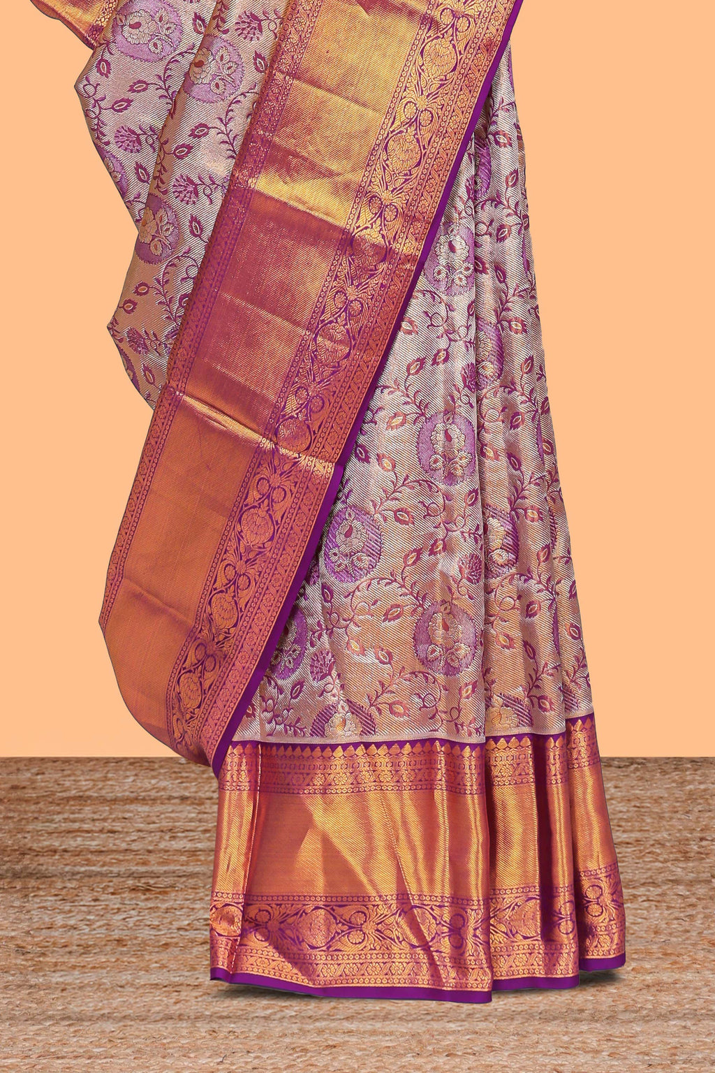 Violet zari floral designed Kanchipuram tissue silk saree with self zari border and zari work pallu comes with matching blouse