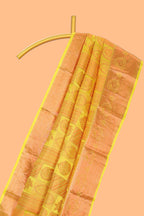 Yellow geometric and floral designed Kanchipuram designer silk saree with self zari border and zari work pallu comes with matching blouse