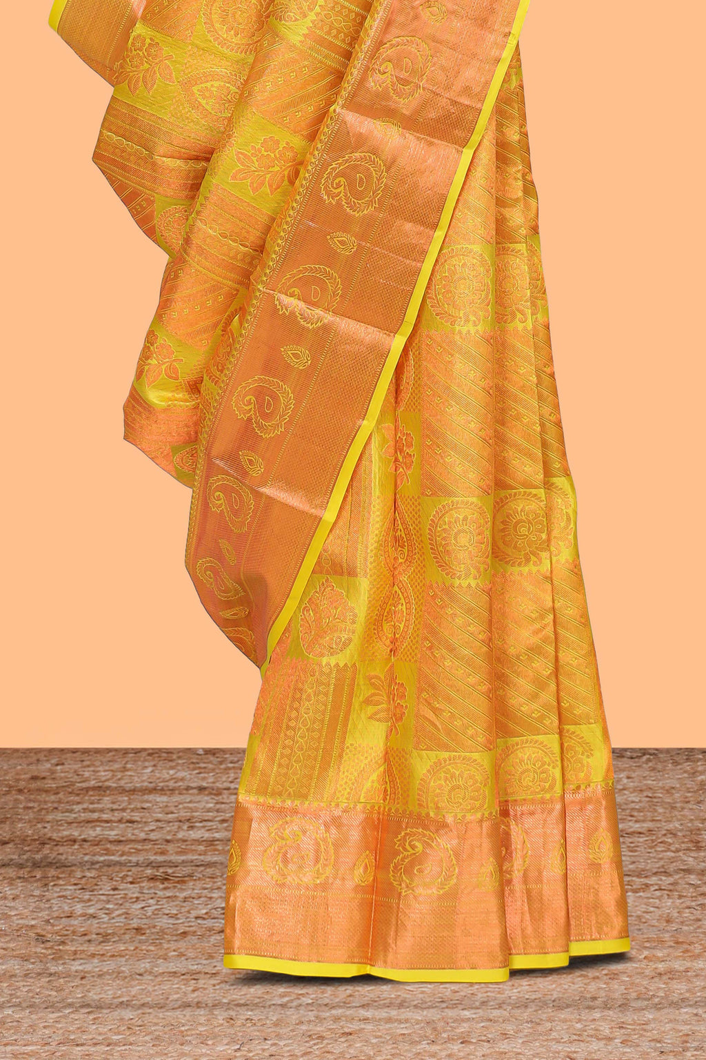 Yellow geometric and floral designed Kanchipuram designer silk saree with self zari border and zari work pallu comes with matching blouse