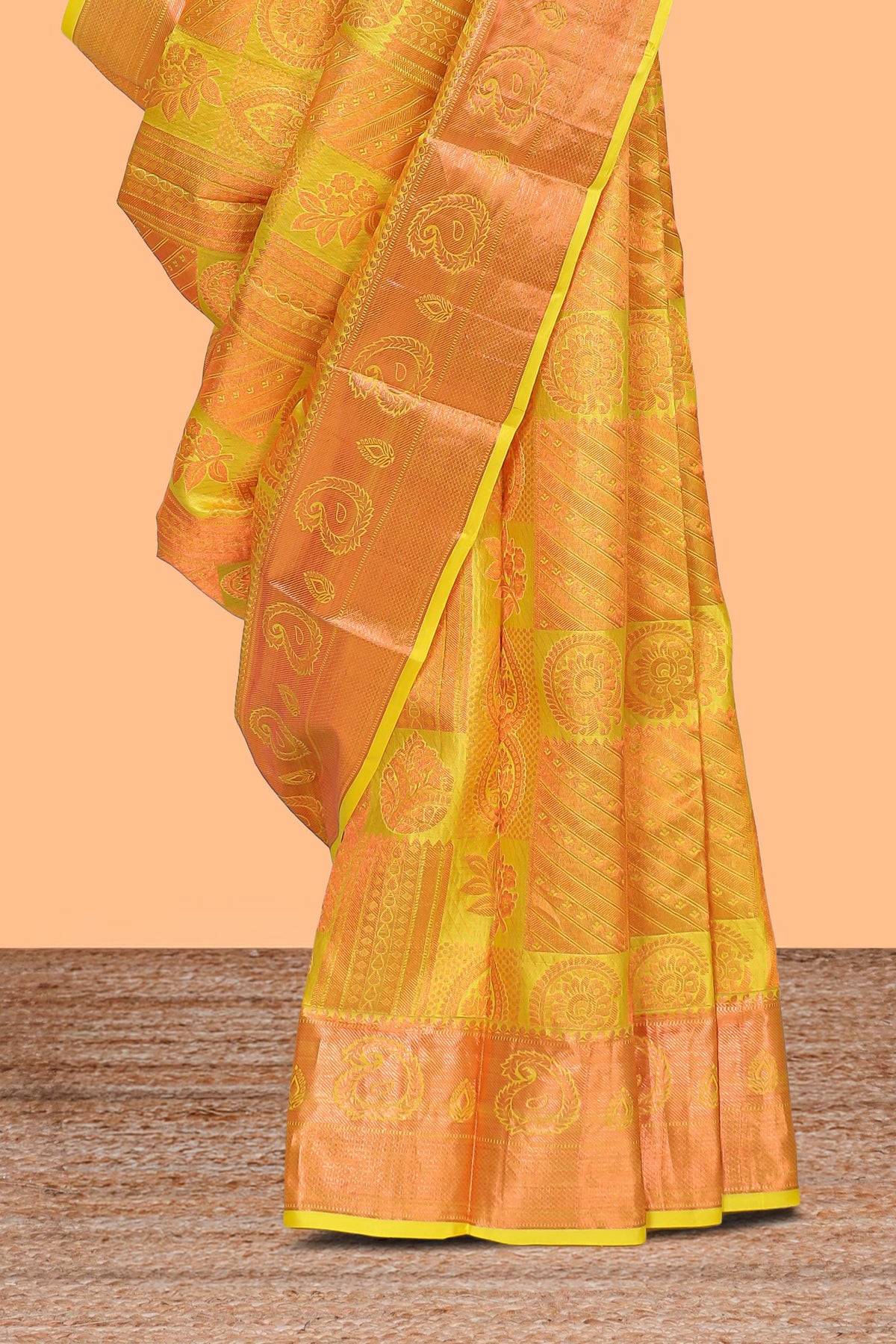 Yellow geometric and floral designed Kanchipuram designer silk saree with self zari border and zari work pallu comes with matching blouse