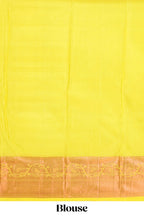Yellow geometric and floral designed Kanchipuram designer silk saree with self zari border and zari work pallu comes with matching blouse