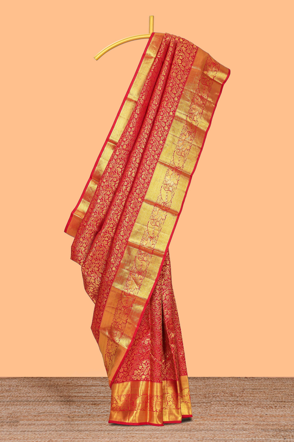 Red floral designed Kanchipuram wedding silk saree with self zari border and zari pallu comes with matching blouse