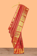 Red floral designed Kanchipuram wedding silk saree with self zari border and zari pallu comes with matching blouse