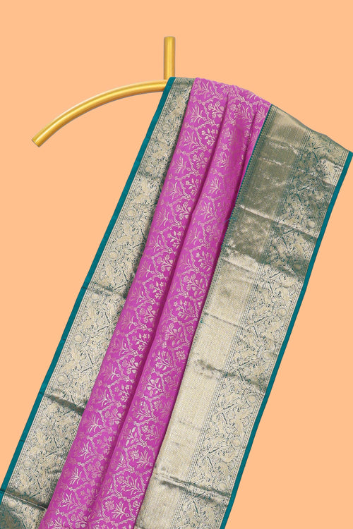 Magenta zari designed Kanchipuram silk saree with contrast zari border and zari work pallu comes with blouse