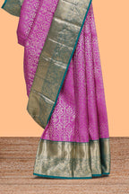 Magenta zari designed Kanchipuram silk saree with contrast zari border and zari work pallu comes with blouse