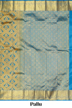 Blue Geometric and butta designed Kanchipuram silk saree with self zari border and zari work pallu comes with matching blouse