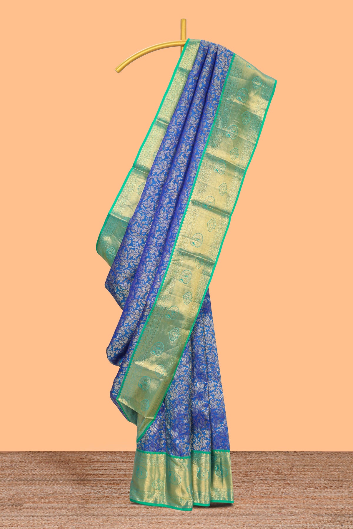 Blue floral designed Kanchipuram silk saree with contrast zari border and zari work pallu comes with blouse
