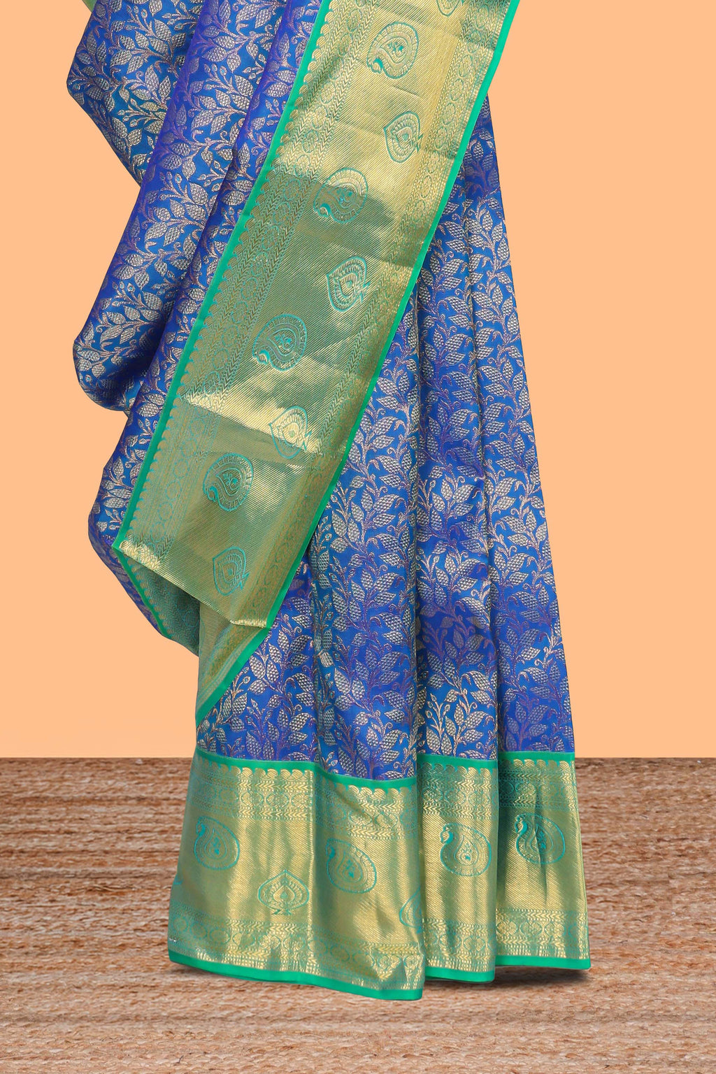 Blue floral designed Kanchipuram silk saree with contrast zari border and zari work pallu comes with blouse