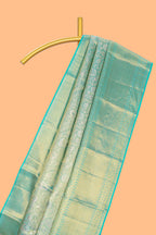 Light sea green floral designed Kanchipuram tissue silk saree with self zari border and zari work pallu comes with matching blouse (Copy)