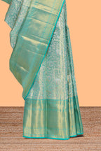Light sea green floral designed Kanchipuram tissue silk saree with self zari border and zari work pallu comes with matching blouse (Copy)