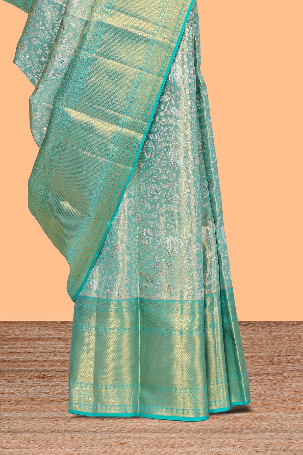 Light sea green floral designed Kanchipuram tissue silk saree with self zari border and zari work pallu comes with matching blouse (Copy)