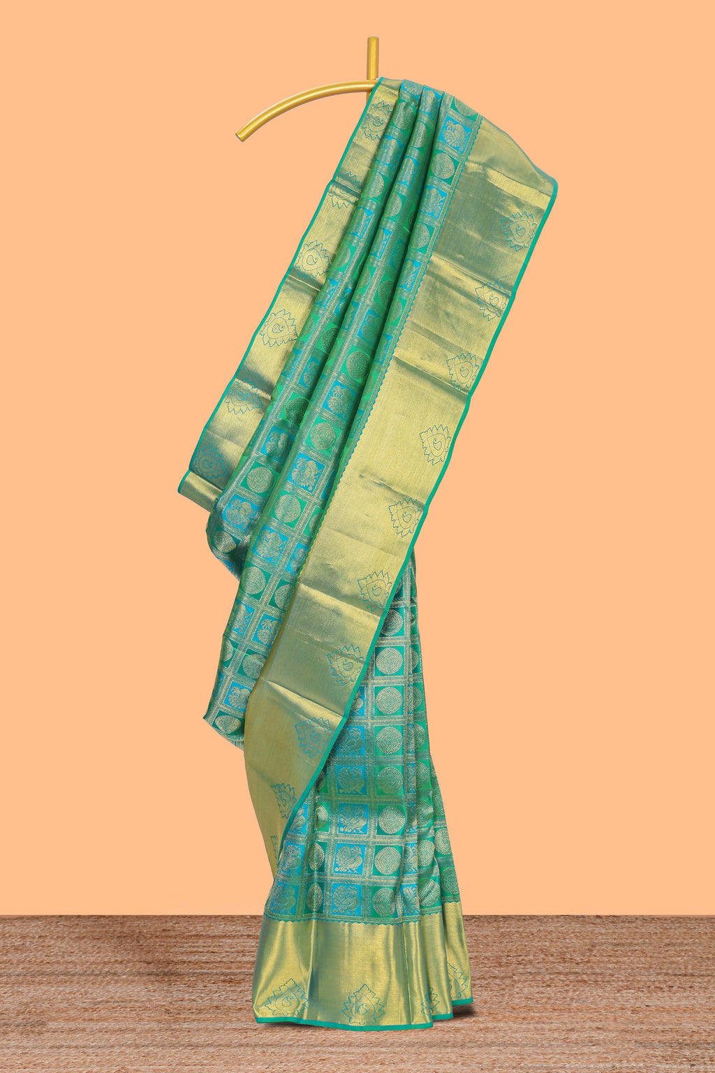Green geometric and butta designed Kanchipuram vairaooi and checks silk saree with self zari border and zari work pallu comes with matching blouse