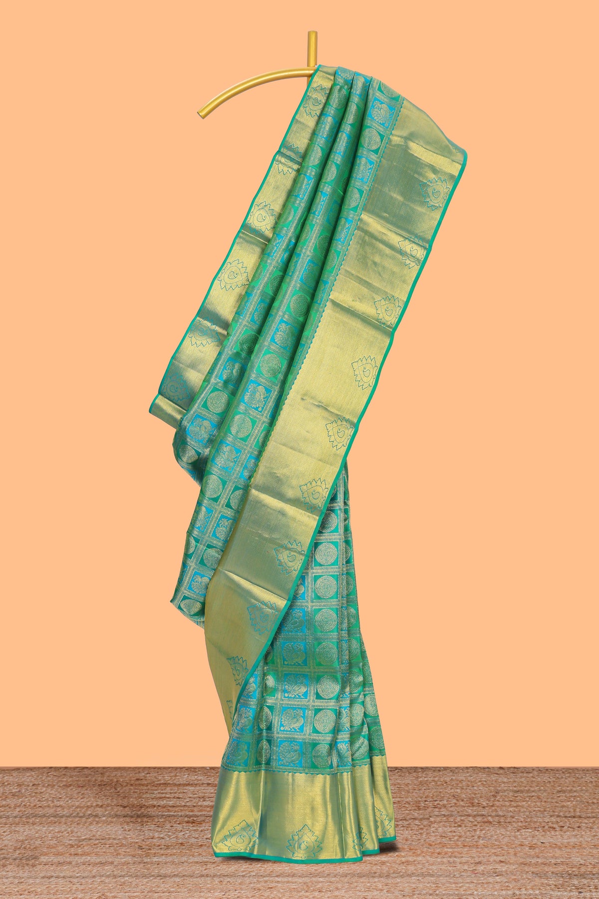 Green geometric and butta designed Kanchipuram vairaooi and checks silk saree with self zari border and zari work pallu comes with matching blouse