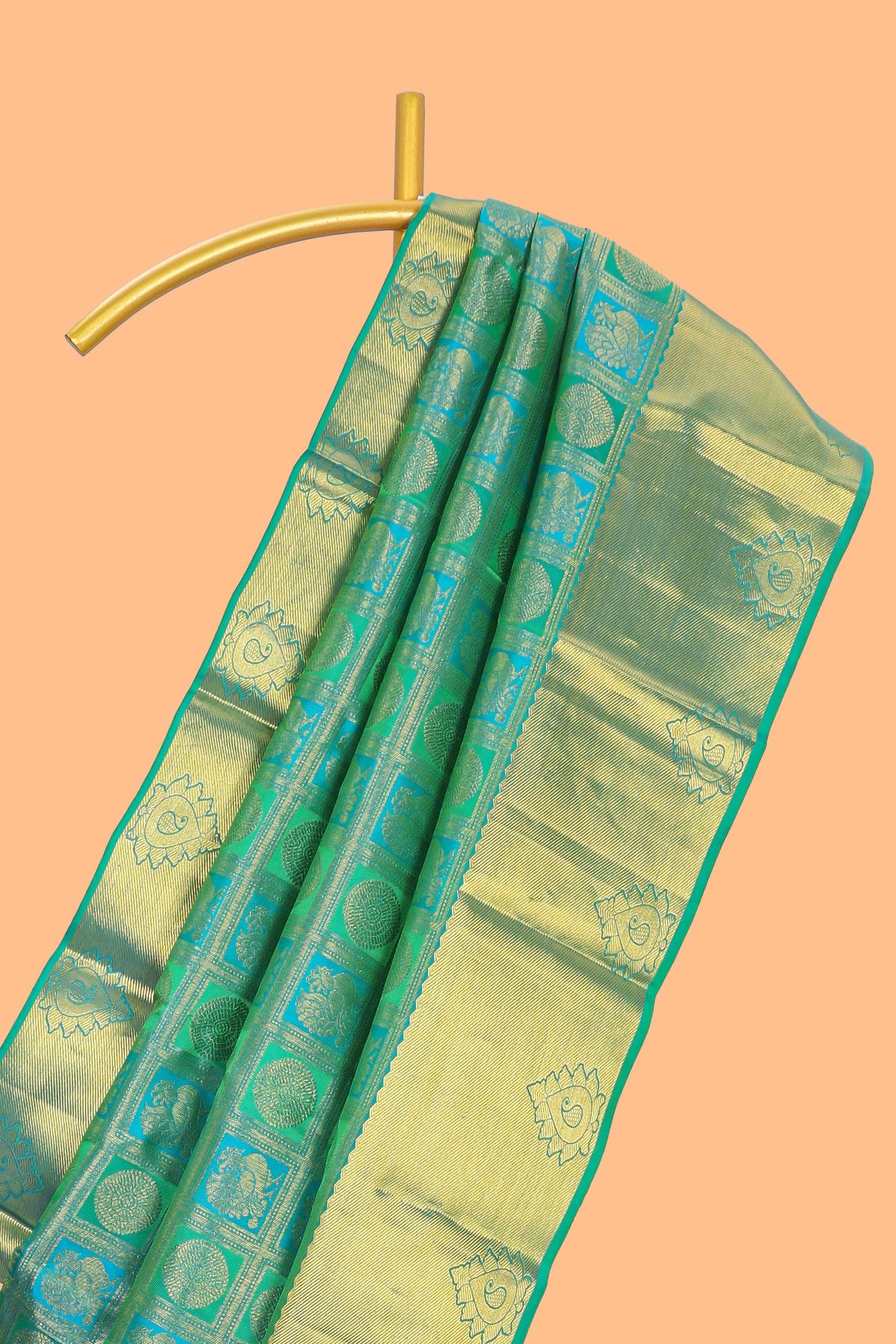 Green geometric and butta designed Kanchipuram vairaooi and checks silk saree with self zari border and zari work pallu comes with matching blouse
