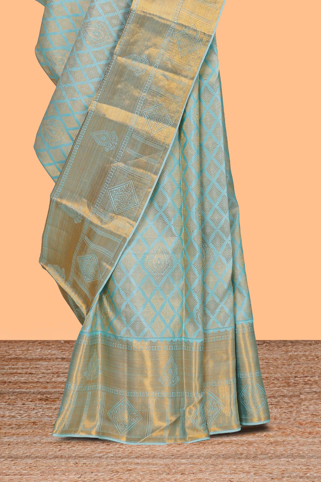 Aqua blue geometric designed Kanchipuram traditional silk saree with self zari border and zari work pallu comes with matching blouse