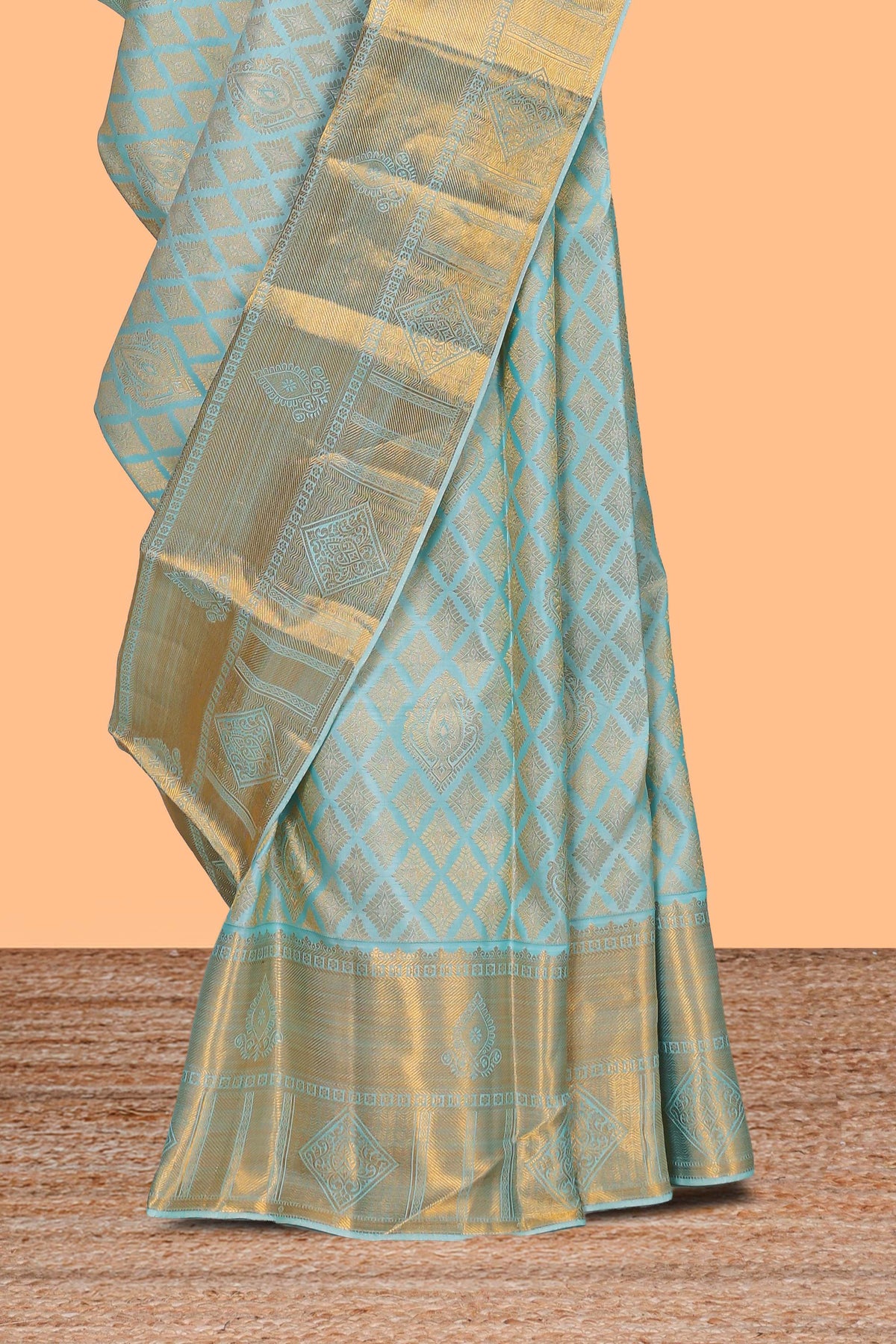 Aqua blue geometric designed Kanchipuram traditional silk saree with self zari border and zari work pallu comes with matching blouse