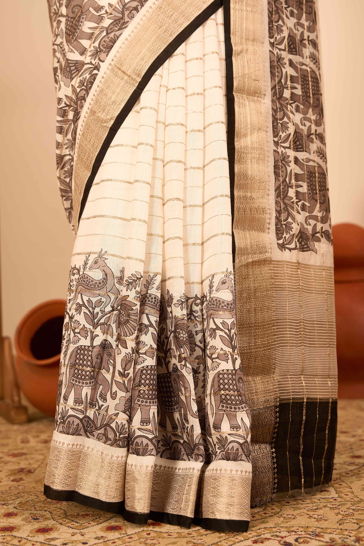 Kalamkari print accents with gold zari borers