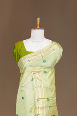 Light green muniya border saree