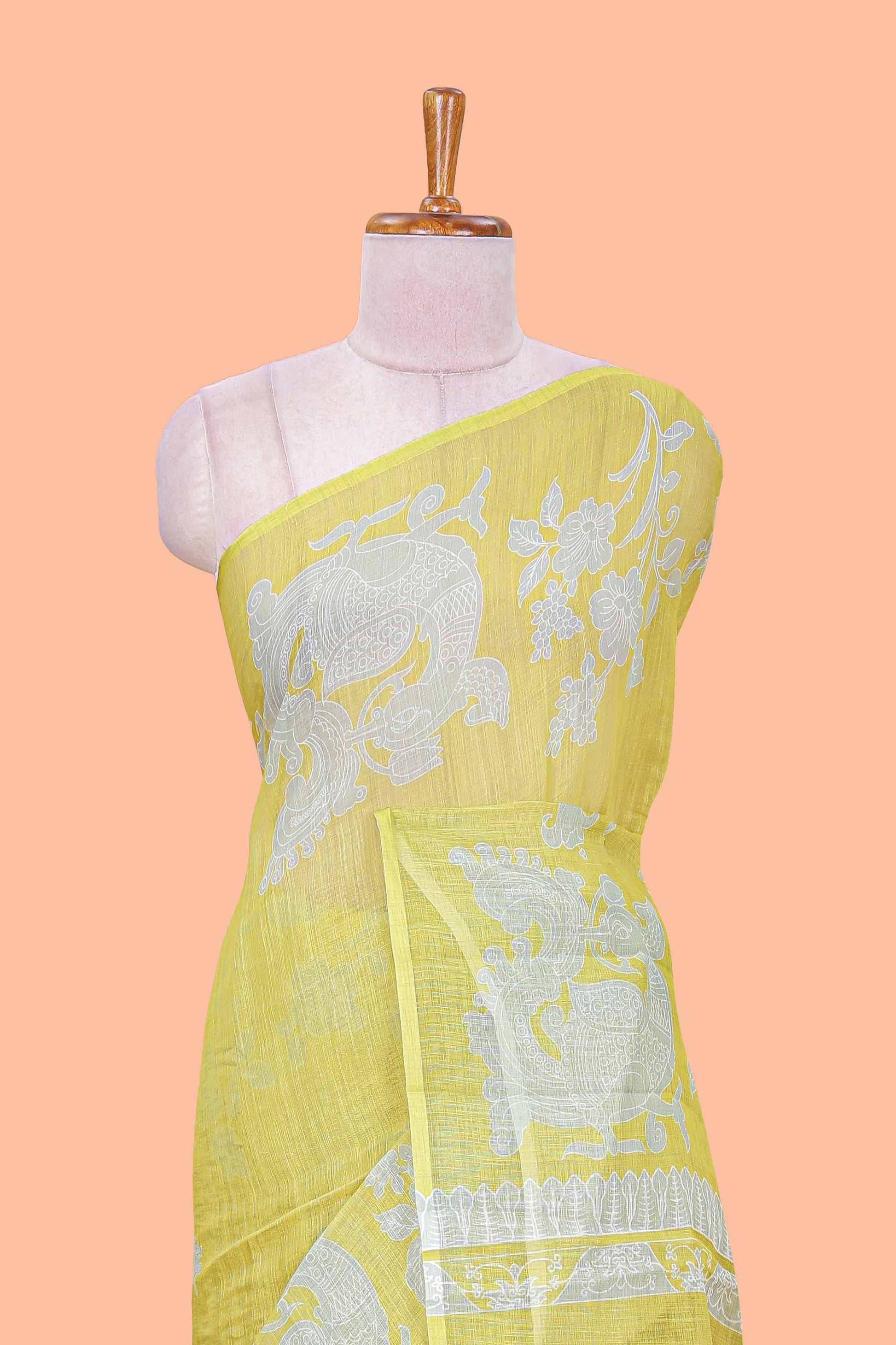 Linen cotton saree with yellow floral design
