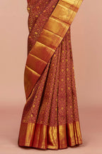 Maroon silk saree with zari border