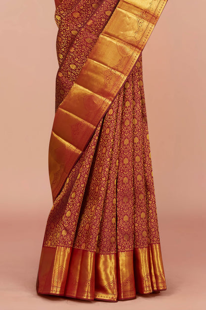 Maroon silk saree with zari border