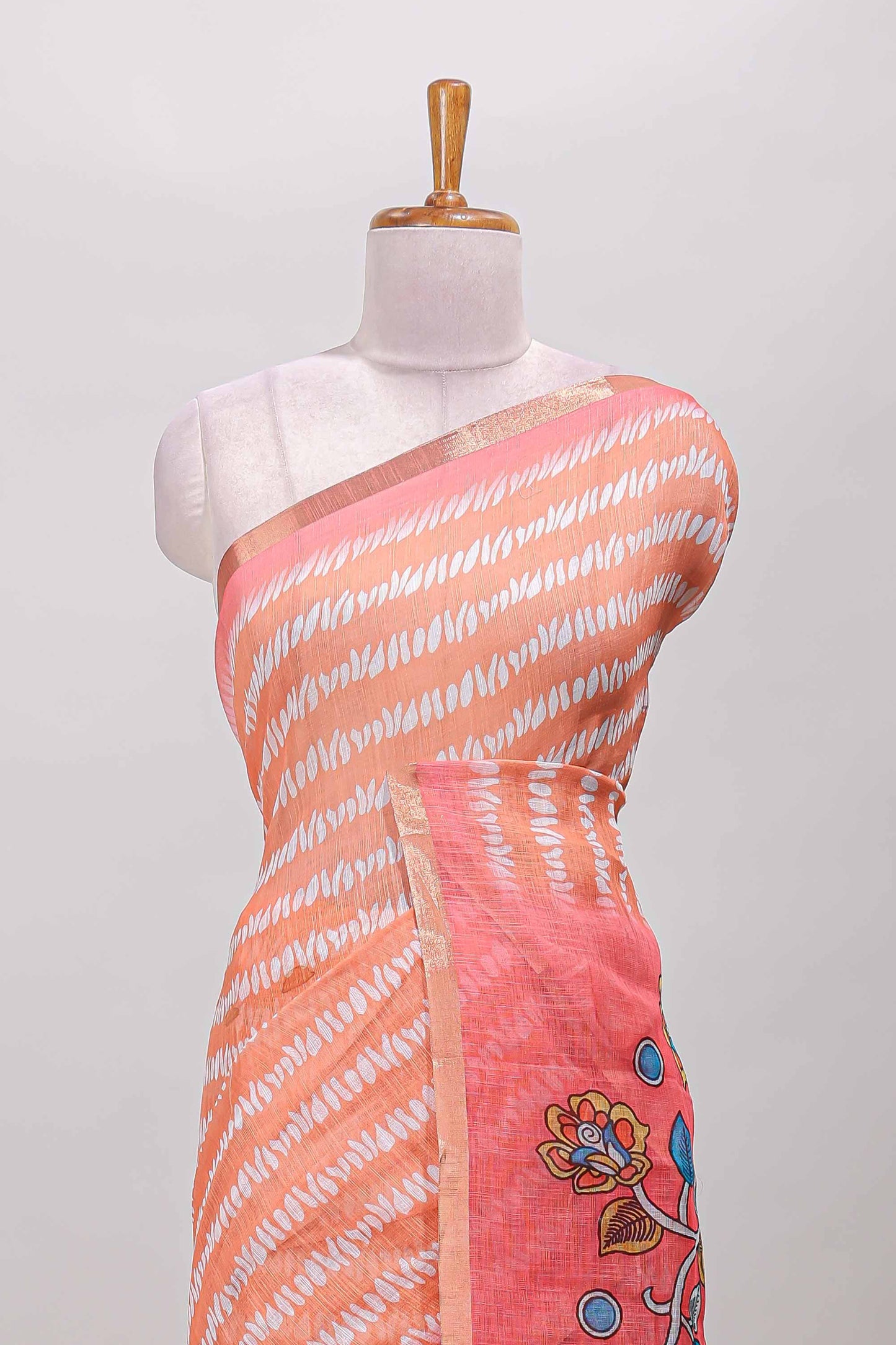 Orange linen saree with self zari border