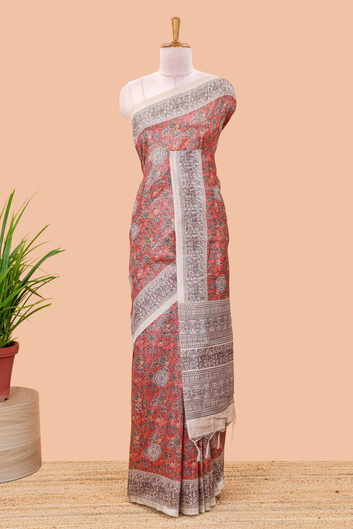 Orange paisley print chanderi cotton saree with medallion pallu