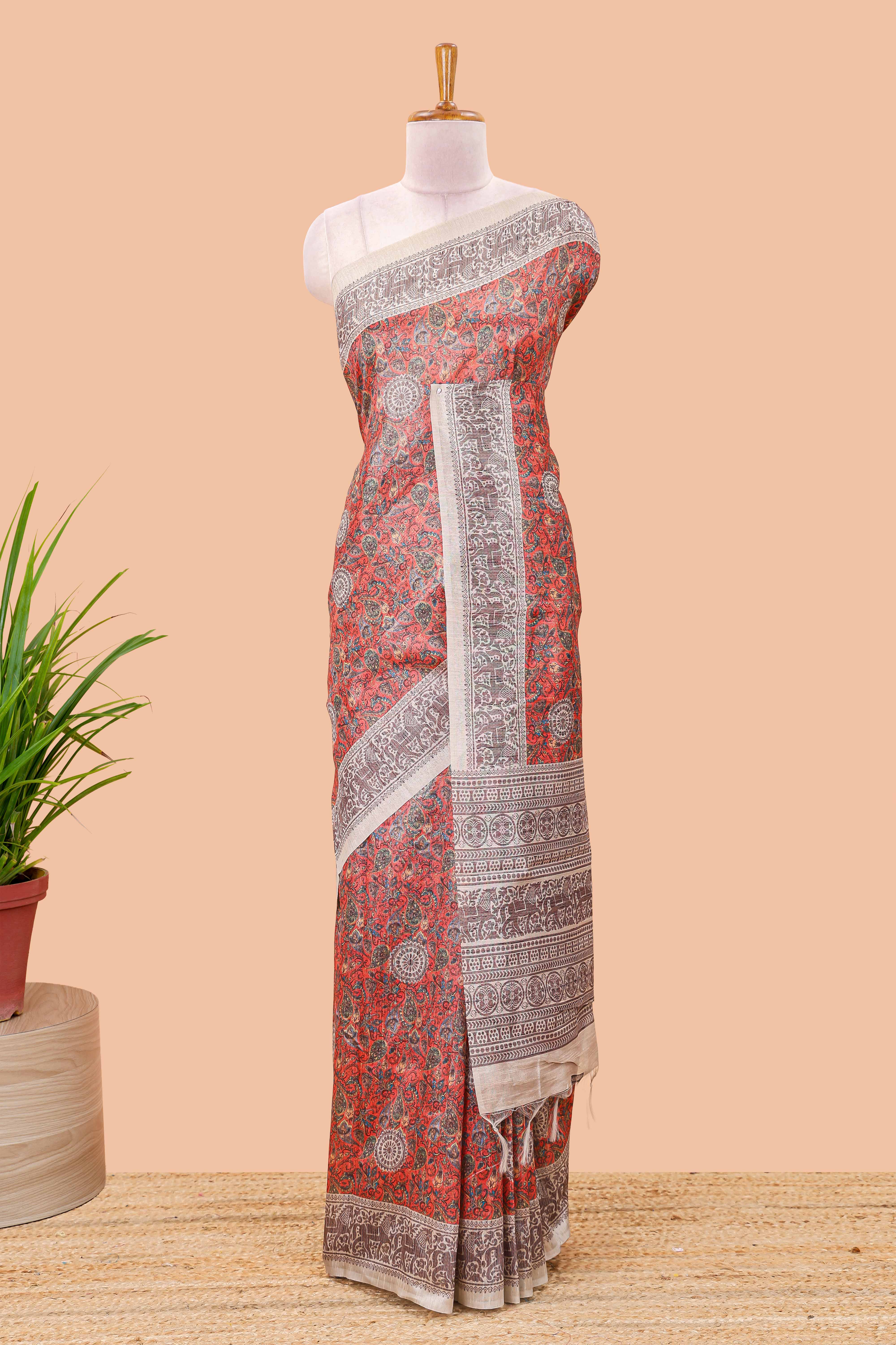 Orange paisley print chanderi cotton saree with medallion pallu