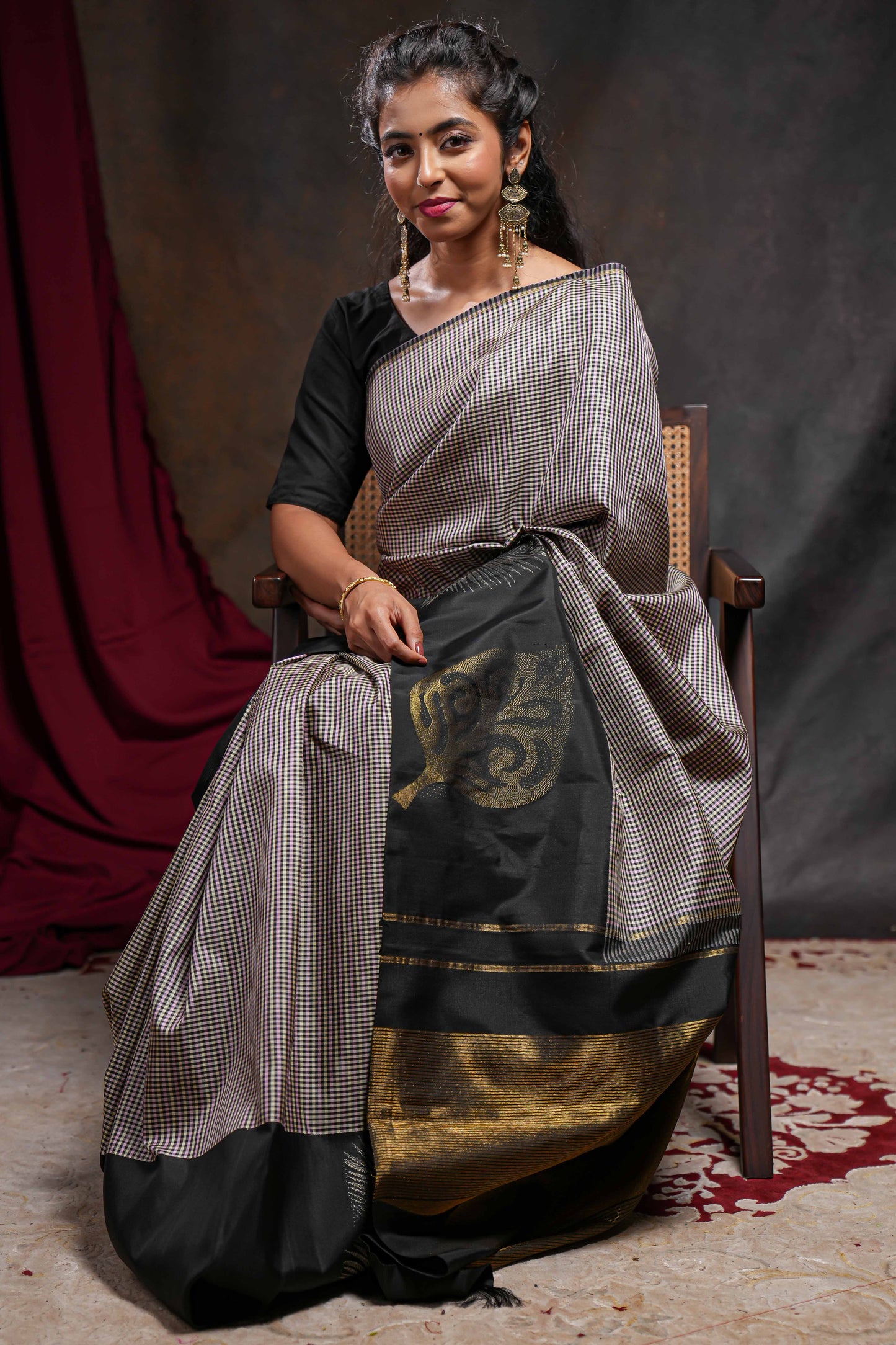 Multi color checked parambariya pattu saree with contrast leaf zari border and golden zari pallu