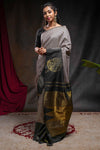 Multi color checked parambariya pattu saree with contrast leaf zari border and golden zari pallu