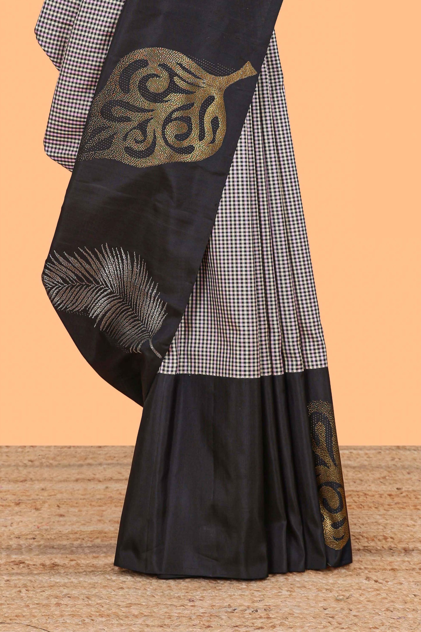 Multi color checked parambariya pattu saree with contrast leaf zari border and golden zari pallu