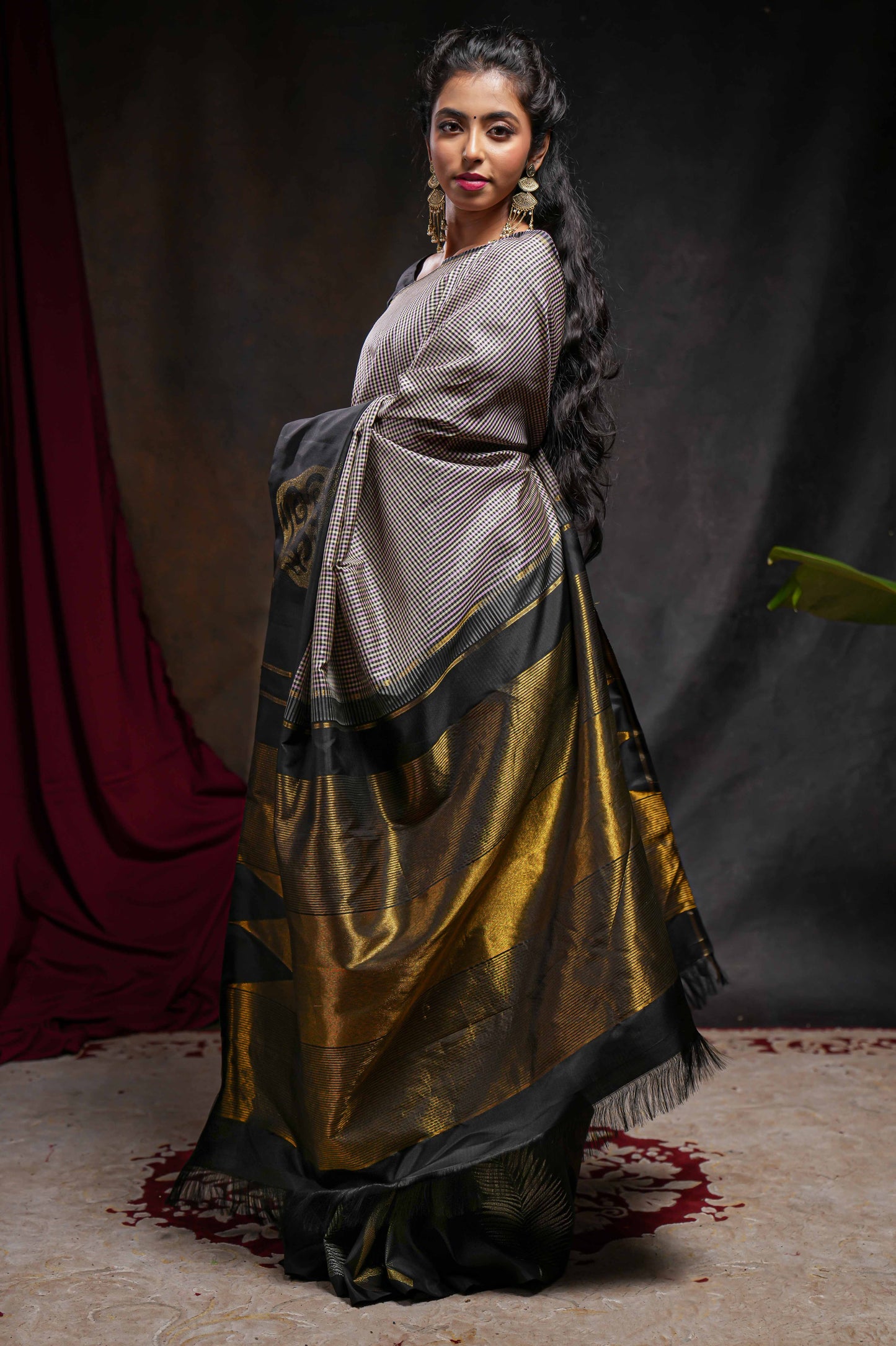 Multi color checked parambariya pattu saree with contrast leaf zari border and golden zari pallu