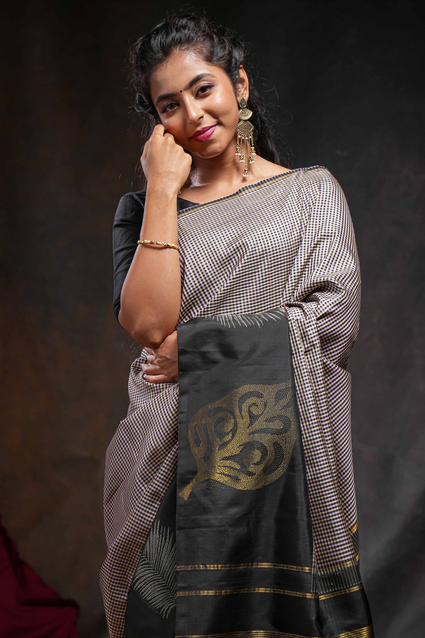 Multi color checked parambariya pattu saree with contrast leaf zari border and golden zari pallu