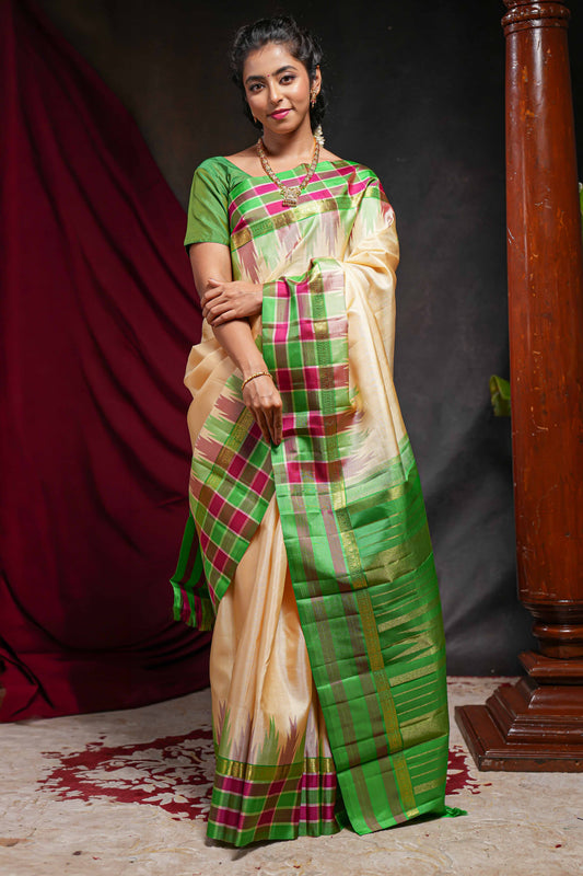 Sandal plain parambariya pattu saree with contrast checked ikkat style border and zari striped pallu