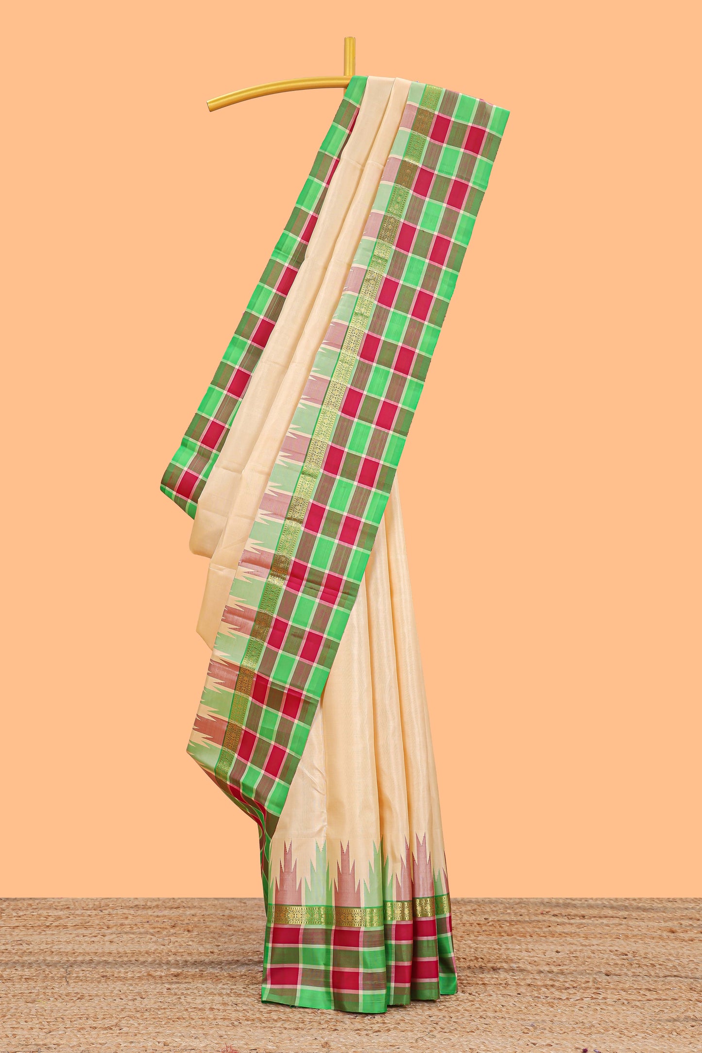 Sandal plain parambariya pattu saree with contrast checked ikkat style border and zari striped pallu
