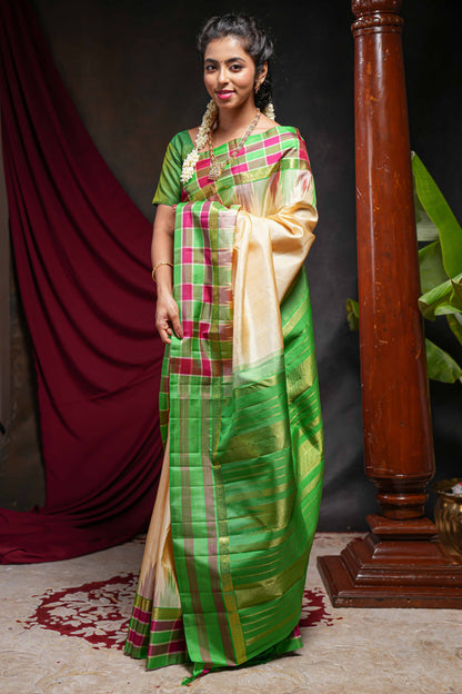 Sandal plain parambariya pattu saree with contrast checked ikkat style border and zari striped pallu