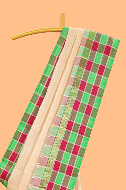 Sandal plain parambariya pattu saree with contrast checked ikkat style border and zari striped pallu